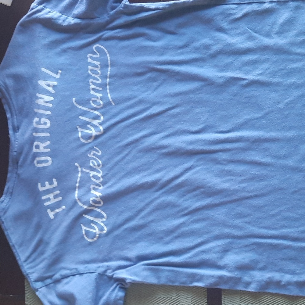 "the original wounder women" grayish blue shirt